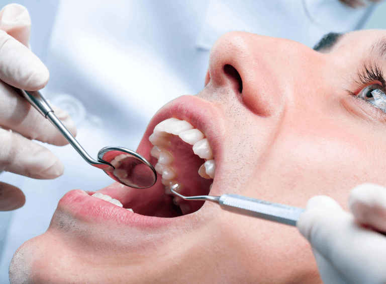 Woman getting tooth implants check up in bolton at Harwood Dental Practice