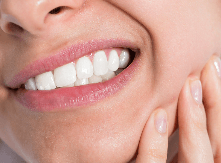 Woman with sensitive teeth visiting harwood dental practice in Bolton