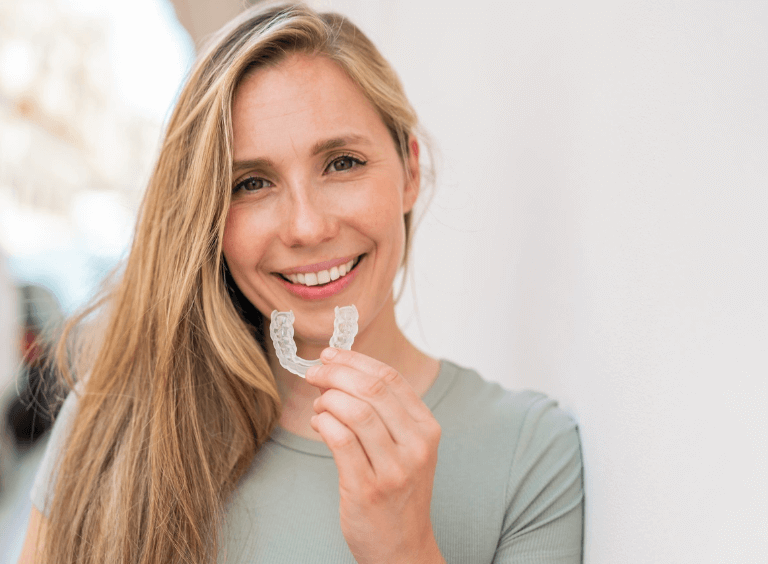 Woman with adult braces in Harwood dental practice in Bolton