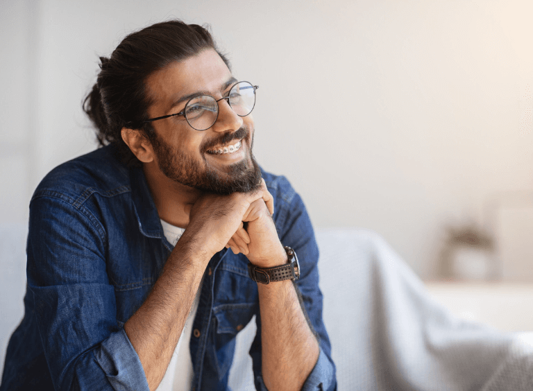 Man with adult braces from his dentist in bolton at Harwood dental practice