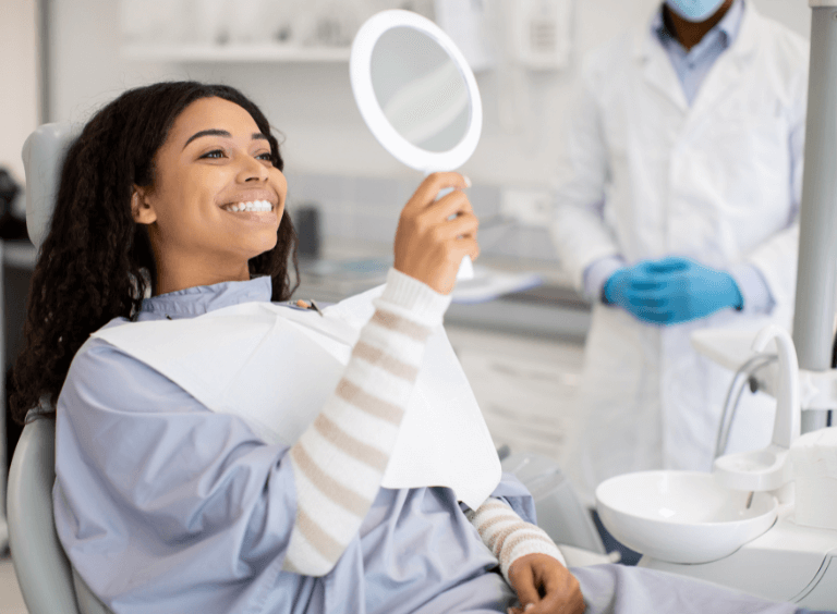 Woman visiting her bolton dentist
